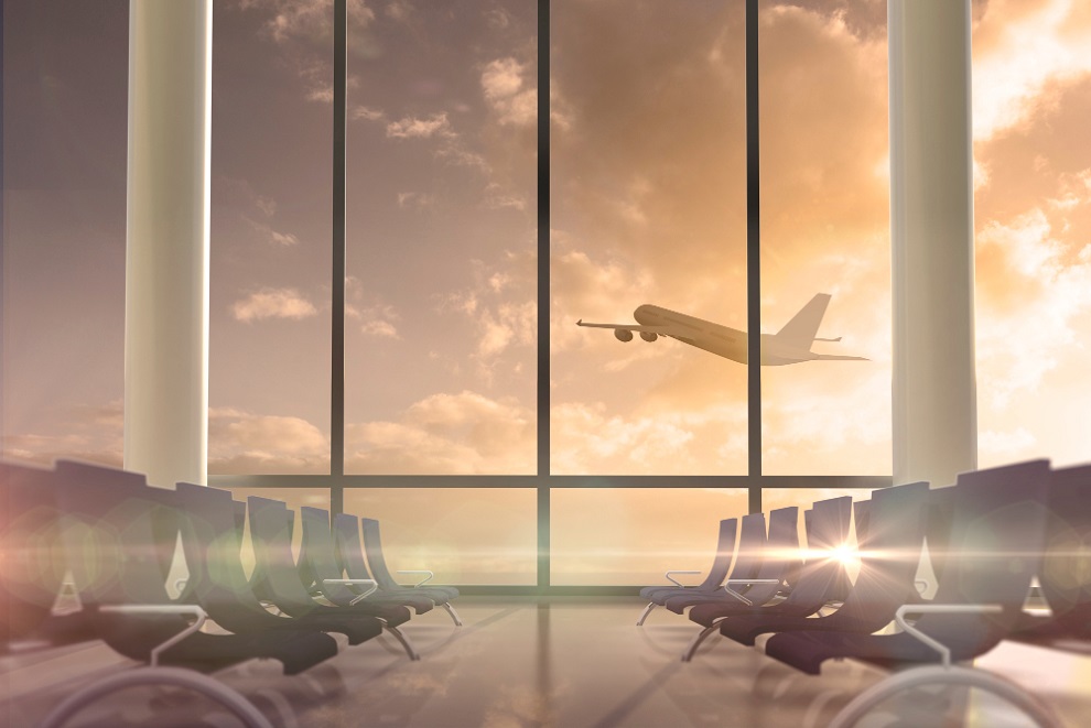 airplane-flying-past-departures-lounge-window-1
