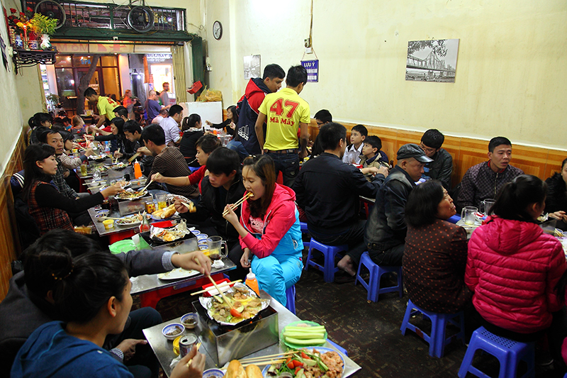 People eating food at Xuan Xuan